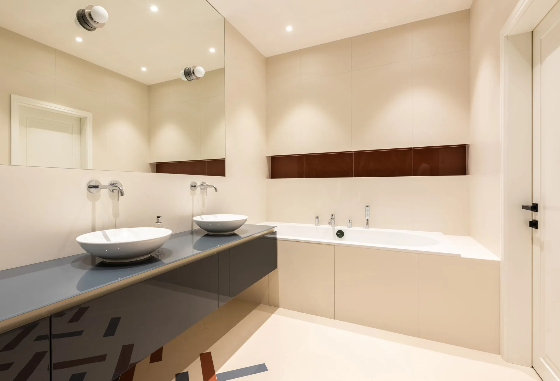 Modern bathroom interior with freestanding bathtub and minimalist fittings