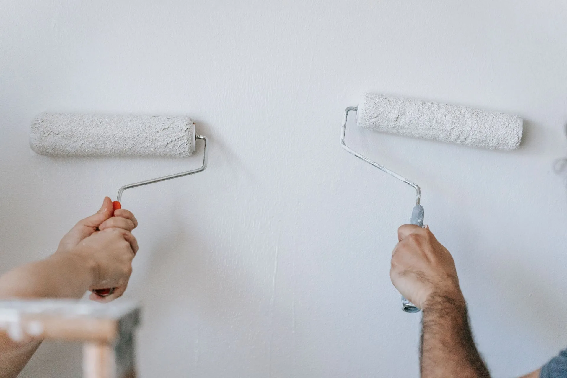 Interior wall being painted with a roller